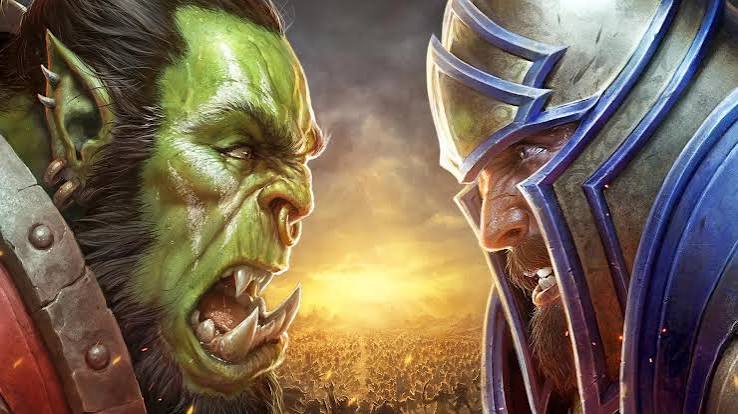 A Blizzard está mexendo em Azeroth outra vez. Em uma nova entrevista ao Windows Central, a equipe de World of Warcraft confirmou que The Last Titan vai colocar o conflito entre facções de volta no centro da história, reacendendo a tensão entre Horda e Aliança depois de anos de trégua instável.

A expansão também introduz um modo heroico para o mundo aberto, uma dificuldade maior que promete deixar as missões e a exploração realmente perigosas de novo, em vez de uma lista de tarefas para correr. É o tipo de recurso que recompensa quem quer sentir o mundo vasto, hostil e digno de ser desbravado.

É uma direção promissora para um MMO que passa duas décadas se reinventando, e uma lembrança do que fez esse jogo importar. Que a ambição chegue inteira aos jogadores, e que quem constrói esses mundos possa fazer isso com emprego estável e liberdade criativa, e não com mais uma rodada de demissões para agradar acionistas.